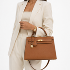 Hermès Kelly 25 Leather Handbag – Gold Brown